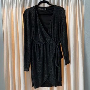 Black sparkly mid length Gabrielle Union dress